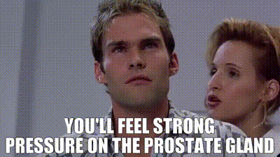 A woman telling a man, “You’ll feel strong pressure on the prostate gland”